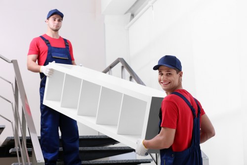 Removal team preparing for a home move in Holland Park