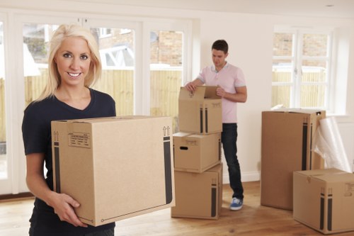 Packed boxes and furniture loaded into a removal van for a local move