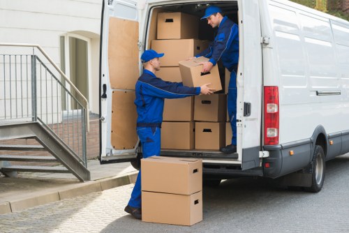 Moving team handling a residential relocation in Holland Park
