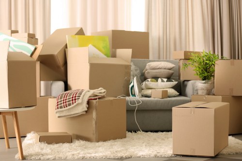 Professional movers handling furniture and boxes during a Brisbane house move