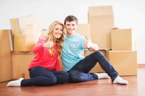 Loading furniture and boxes into a removals van in West London