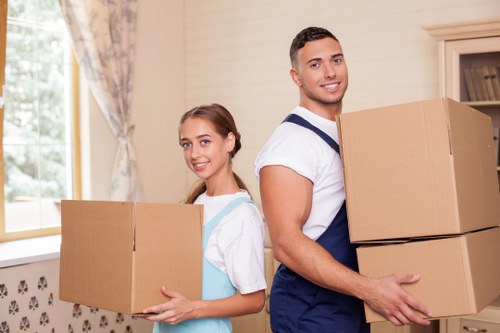 Packed office equipment and furniture ready for a business move