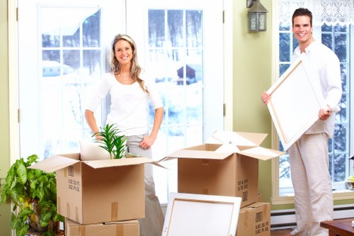 Business movers handling office furniture in West London