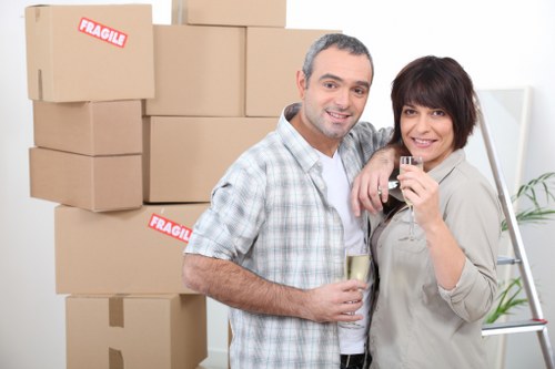 Packed boxes and furniture ready for a local removals service